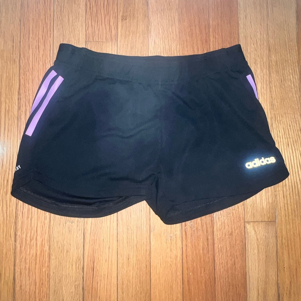 Black Adidas shorts.